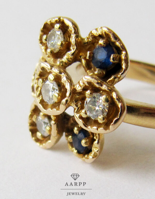 750 Gelbgold Ring Blütenform Diamanten blaue Edelsteinen
