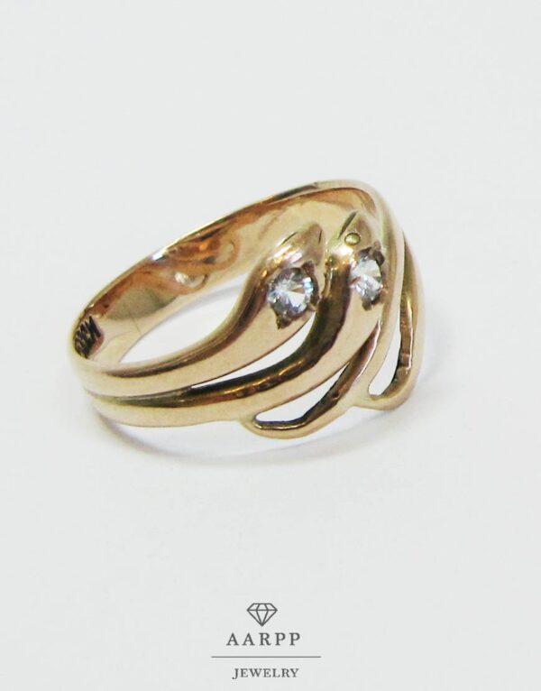 Schlangenring Gold Ring mit zwei Schlangenköpfen und facettiertem Zirkon